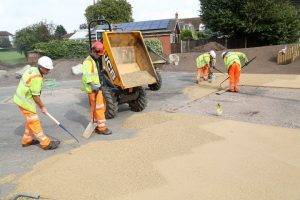 Laying surfacing at Coleshill Memorial Park