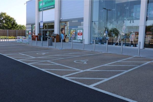 Coloured paving for parking bays