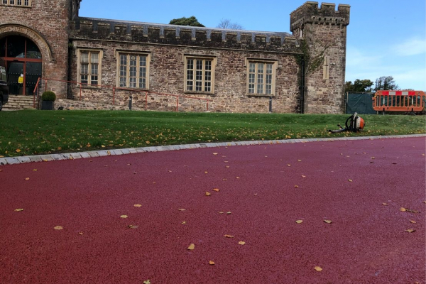 NatraTex Coloured Surfacing Castle in Background
